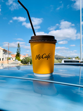 Marinette, WI USA - Nov9,2019: McDonald's logo and Hot Coffee of McCafe is made by McDonald's, the largest fast food restaurant chain.のeditorial素材