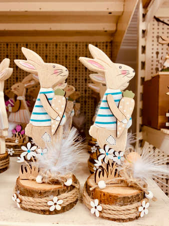 Easter design. Easter Bonny. Bunny rabbit wooden decoration. shop shelfの写真素材