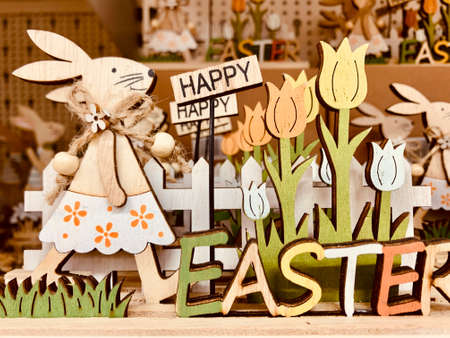 Easter design. Easter Bonny. Bunny rabbit wooden decoration. shop shelfの写真素材