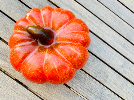 Pumpkins on wooden background top viewの写真素材