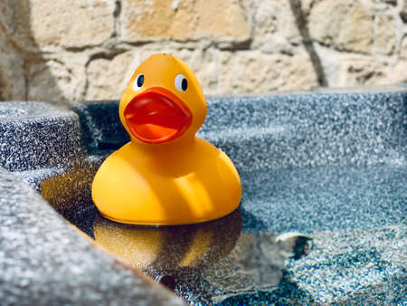 big yellow Rubber duck in bathtub hot tubの写真素材