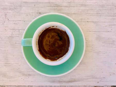 coffee cup with space on the wooden table top viewの写真素材