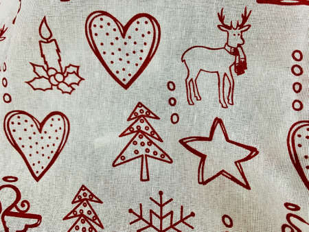 Christmas background white and red crumpled closeup with deers hearts fir trees starsの写真素材