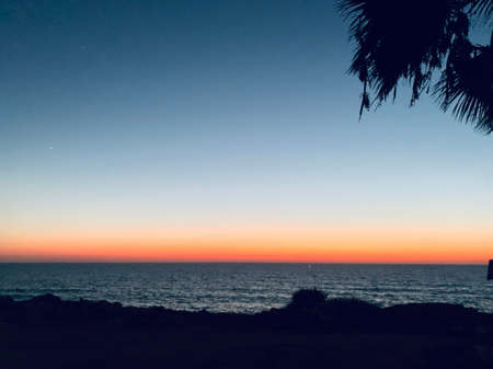 Calm sea with sunset sky Meditation ocean and sky background. Tranquil seascape. Horizon over the water.の写真素材