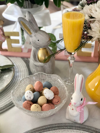 Beautiful Easter table setting with festive decor indoors