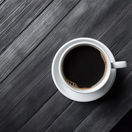 Coffee cup top view on wooden table backgroundの素材