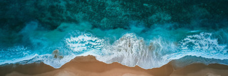 Panoramic aerial view of the sea Top view aerial photo of an seascape. Ocean wave with foam and rocks. Turquoise waterの素材