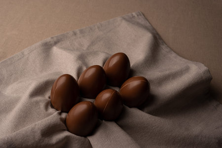 Chocolate easter eggs on a linen beige napkin