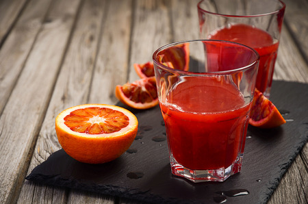 Bloody oranges with juice.の写真素材