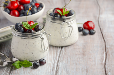 Chia seed pudding with fresh berries, healthy breakfast concept, selective focusの写真素材