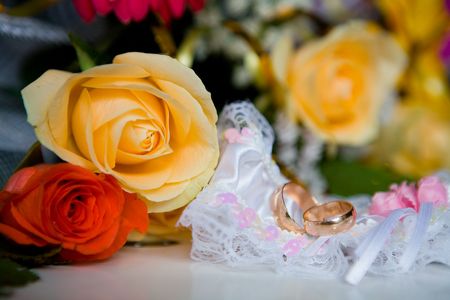 Garter and wedding ringsの写真素材