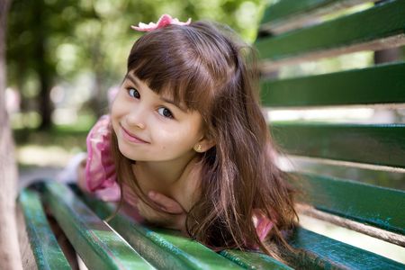 Girl in summer parkの写真素材
