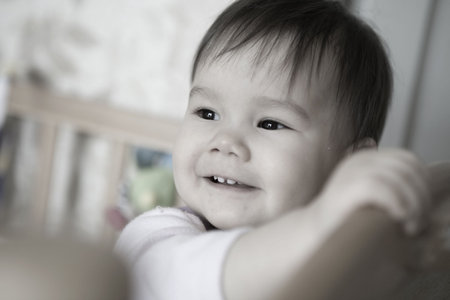 Baby in bedの写真素材