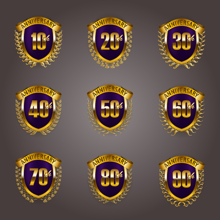 Set of gold anniversary badges with laurel wreaths, shield, numbers. Decorative emblem of jubilee on gray background. Filigree element, frame, border, icon, logo for web, page design in vintage styleのイラスト素材