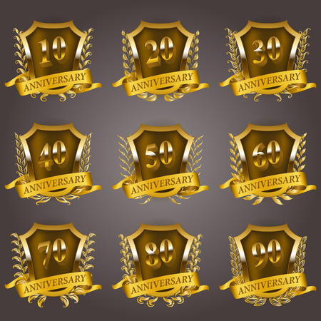 Set of gold anniversary badges with laurel wreaths, shield, numbers. Decorative emblem of jubilee on gray background. Filigree element, frame, border, icon, logo for web, page design in vintage styleのイラスト素材