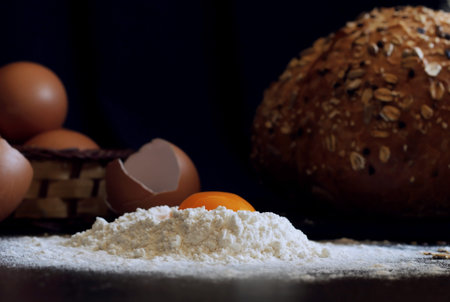 View of the ingredients for making bread and other flour products are. Eggs, flour and ready-made...