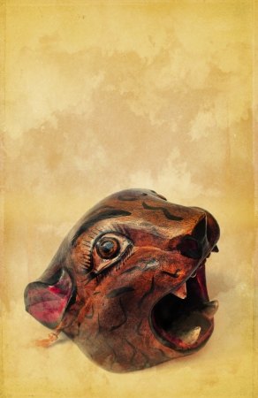 Vintage jaguar head carved in wood - backgroundの写真素材