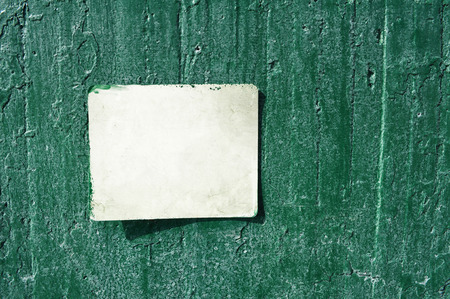 White rusty grungy old sign on a cement wall  texture with rain droops background ready for your textの写真素材