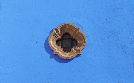 Mexican Colonial Window with Blue Wall paintの写真素材
