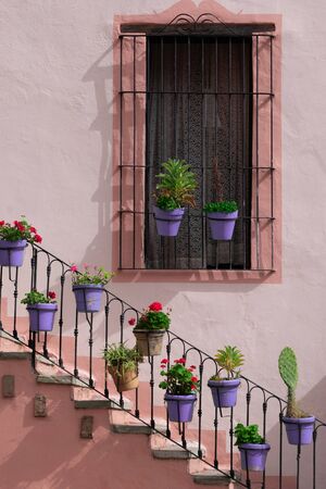 Colonial Style Window Balcony and Stairs in Guanajato Mexico.の写真素材