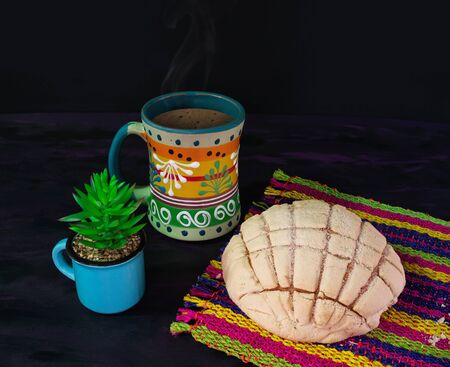 Concha Bread, Mexican Sweet Scone and Coffee Jar on Woven Tablecloth.の写真素材