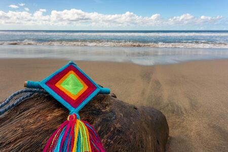 Mandala Eye of God Mexican Huichol Crafts in Sayulita beach.の写真素材
