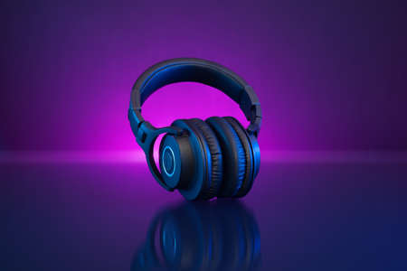 Wireless Gamer Headphones Dark Background and Neon Light.の写真素材