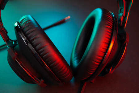 Gamer Headphones Dark Background and colorful Light.の写真素材