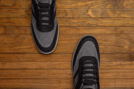 Flat Lay View men shoes on wood background studio photographyの写真素材