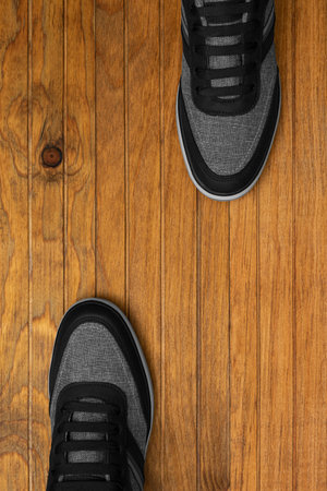 Flat Lay View men shoes on wood background studio photographyの写真素材