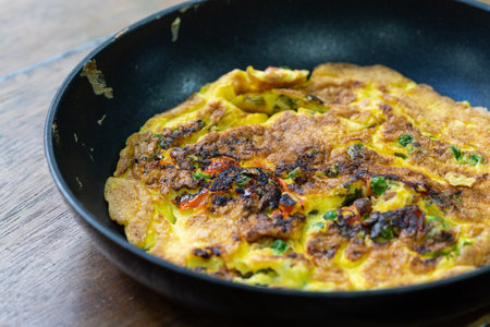 Hot omelet in skillet ready to eat. healthy foodの写真素材