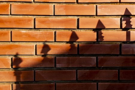 Red brick wall texture grunge backgroundの写真素材