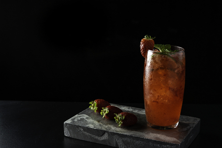 Brazilian Strawberry Caipirinha is on the bar. Space for text. Photo for the menu.の写真素材