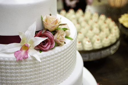 Scenic cake on a table decorated for a wedding party.の写真素材