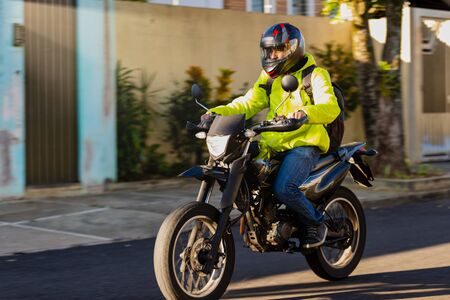 Delivery man driving to his destination to deliver.の写真素材