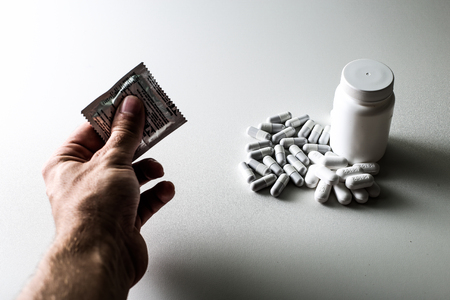 Set of photos for campaigns against HIV and sexually transmitted diseases with the proposal to make a choice, Whether to Prevent or remedyの写真素材