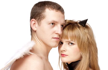 angel man  and devil girl  over whiteの写真素材