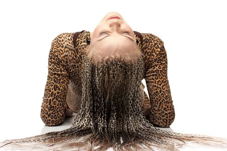 Portrait of the beautiful young woman with braids on a white backgroundの写真素材
