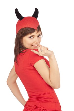 Picture of a girl in a devil costume over white backgroundの写真素材