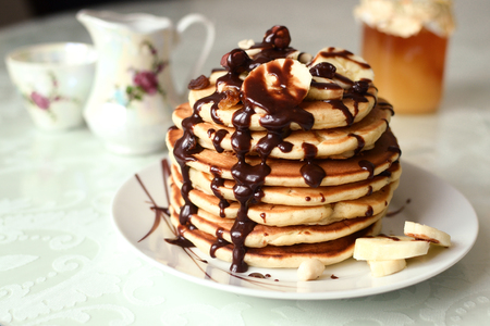 pancakes with banana and chocolateの写真素材