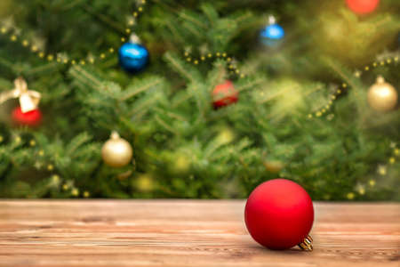 Ð¡hristmas ornament on the background of a decorated Christmas treeの写真素材