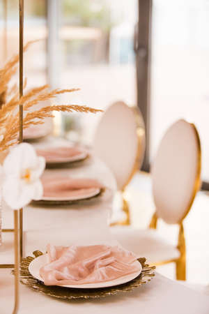 Table setting at a luxury wedding andの写真素材