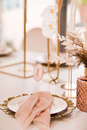 Table setting at a luxury wedding andの写真素材