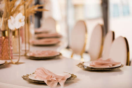 Table setting at a luxury wedding andの写真素材