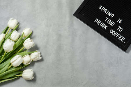 tulips on the background of a felt board with the inscription in English . Flat lay, top viewの写真素材