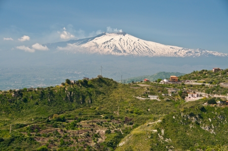 Smoking Etna Volcano Seen form Taorminaの写真素材