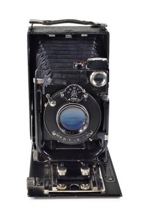 Donetsk, Ukraine - June 6, 2014: Retro camera FOTOKOR-1 - soviet plate folding photographic camera format 9-12 cm, roduced by GOMZ in the 1930-1940s. Isolated on white background.のeditorial素材