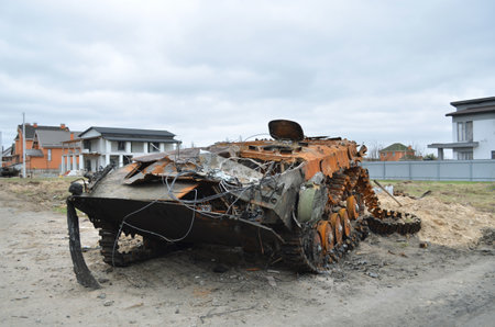 Dmytrivka village, Kyev region, Ukraine - April 13, 2022: Destroyed infantry fighting vehicle of the Russian army following the Ukrainian forces counter-attacks. War of Russia against Ukraine.のeditorial素材