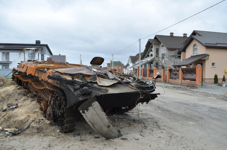 Dmytrivka village, Kyev region, Ukraine - April 13, 2022: Destroyed infantry fighting vehicle of the Russian army following the Ukrainian forces counter-attacks. War of Russia against Ukraine.のeditorial素材