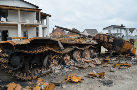 Dmytrivka village, Kyev region, Ukraine - April 13, 2022: Destroyed Russian tank following the Ukrainian forces counter-attacks. War of Russia against Ukraine.のeditorial素材